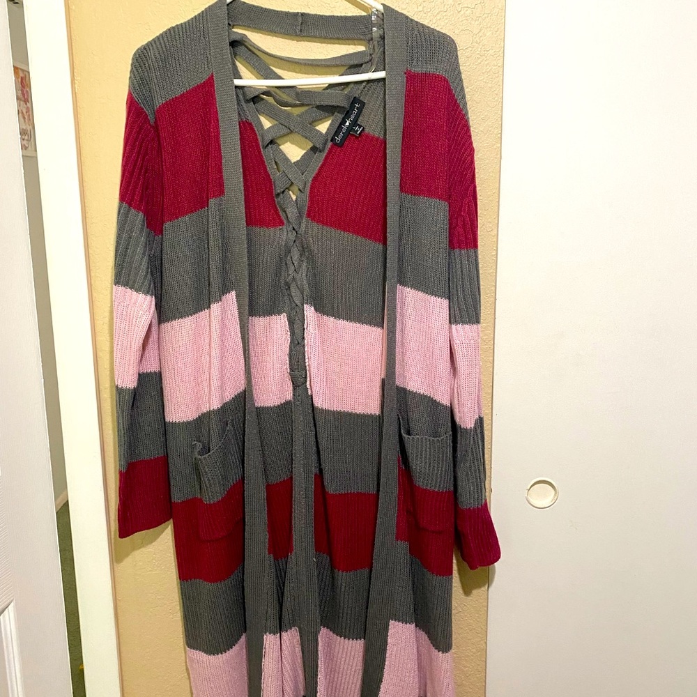 Pink, maroon, multi colored cardigan.